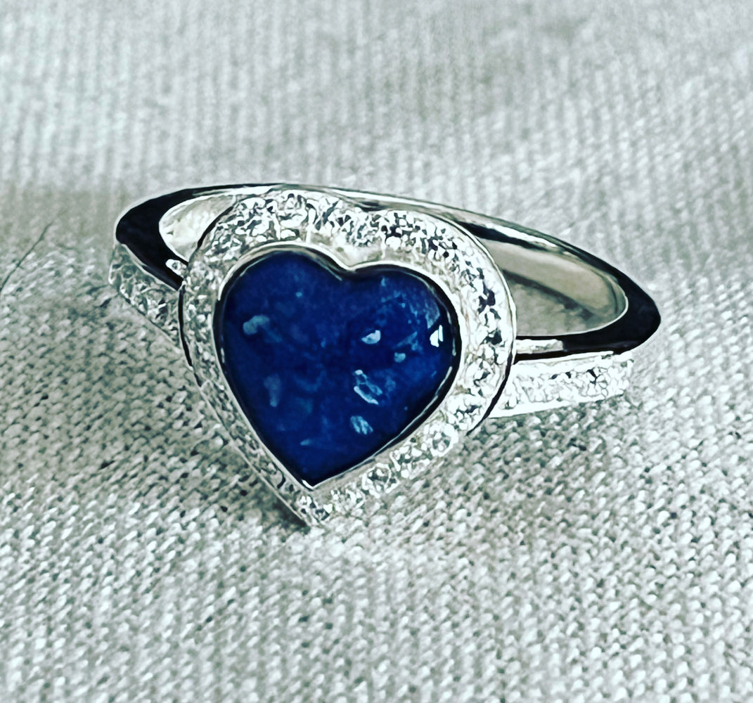 Heart ashes ring with cubic zirconia.