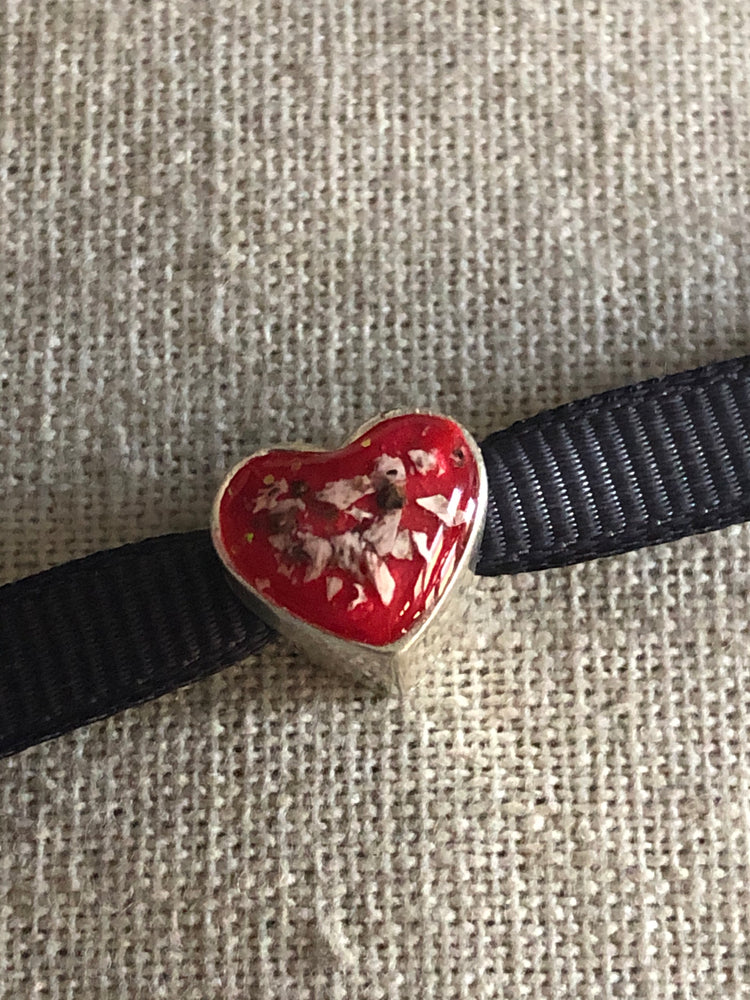 Ashes set in resin heart bead charm