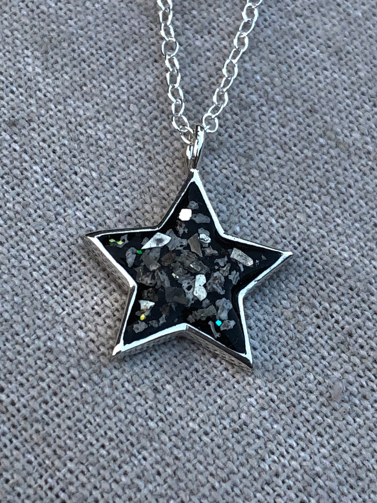 Ashes set in resin star pendant