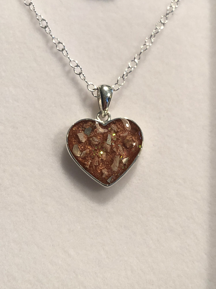 Ashes set in resin heart pendant