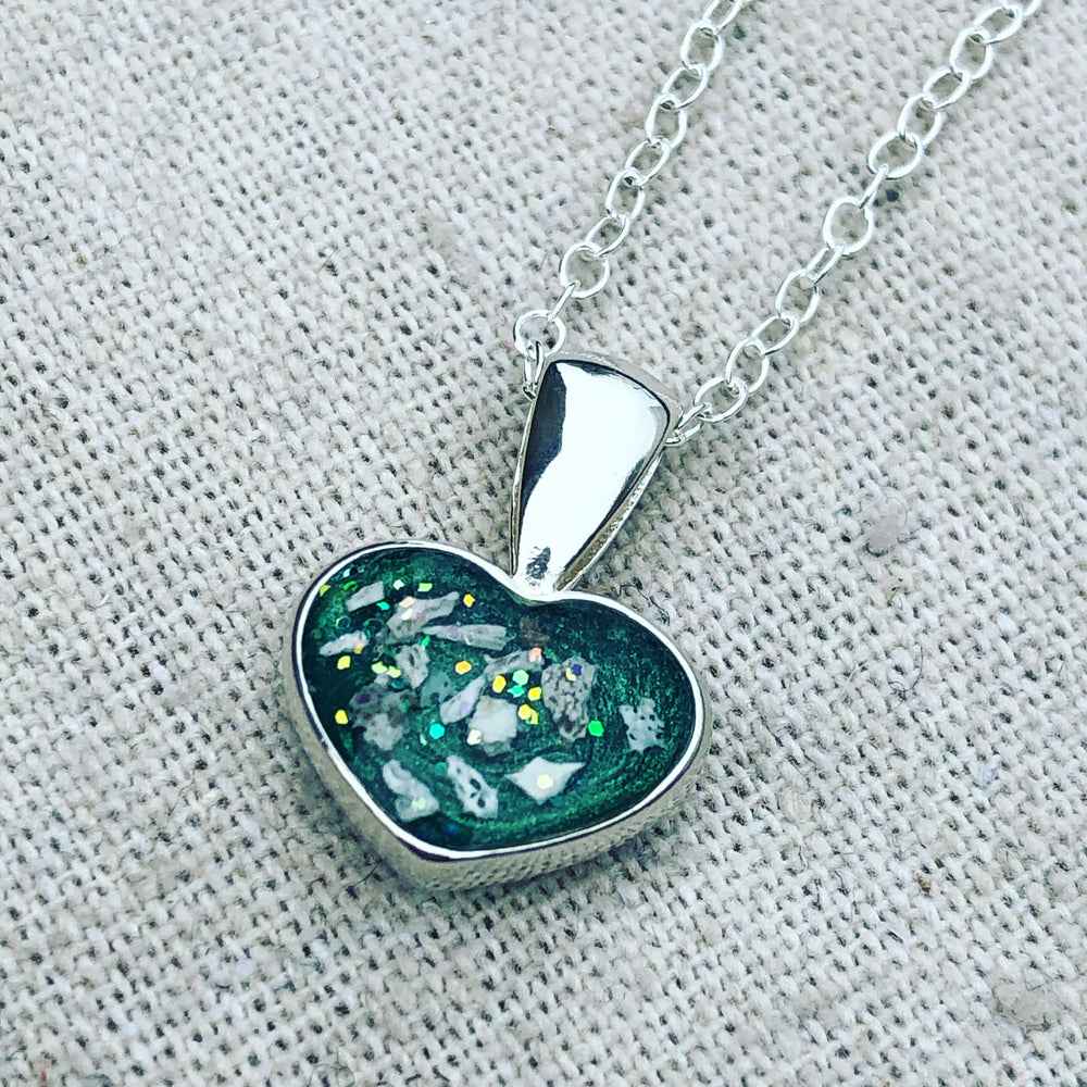 Ashes set in resin small heart pendant